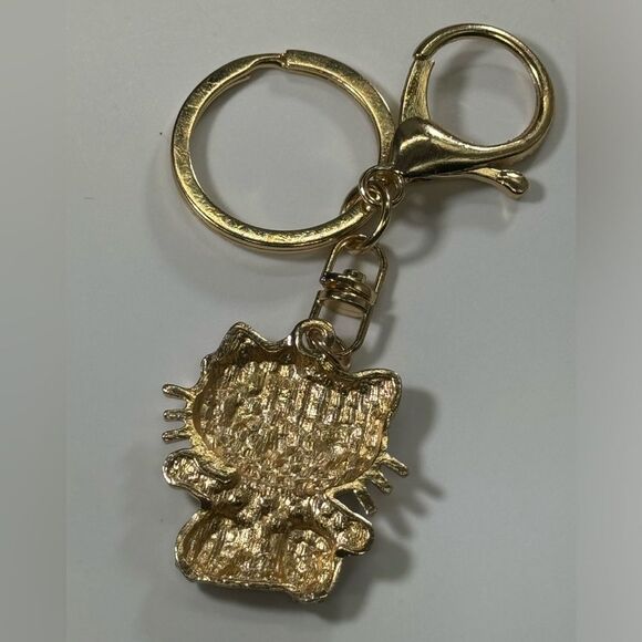 BAG CHARM Hello Kitty Gold Tone Crystal Hair Bow Bag Charm Keychain - Picture 2 of 6